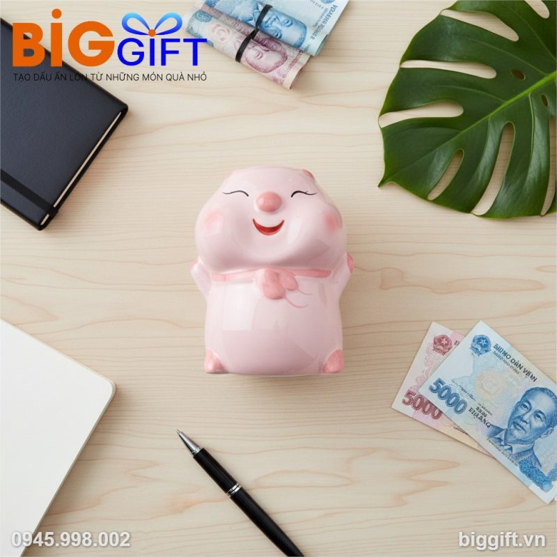 Heo đất quà tặng in logo bánh bao màu hồng 19x20x23cm HĐ02