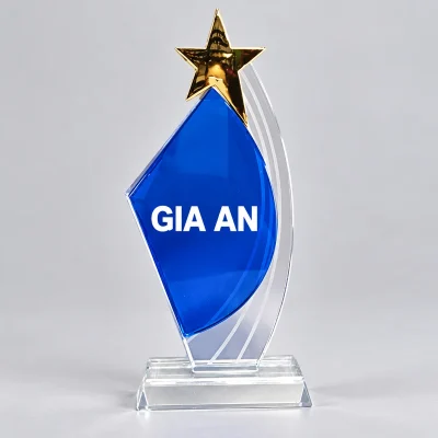Biểu trưng pha lê 06 thân xanh viền cong sao vàng – gia an màu trắng trên vùng xanh trống