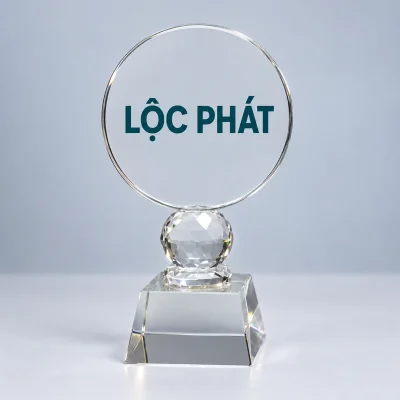 Biểu trưng pha lê mặt tròn chân cầu – demo logo ở khoảng giữa mặt tròn