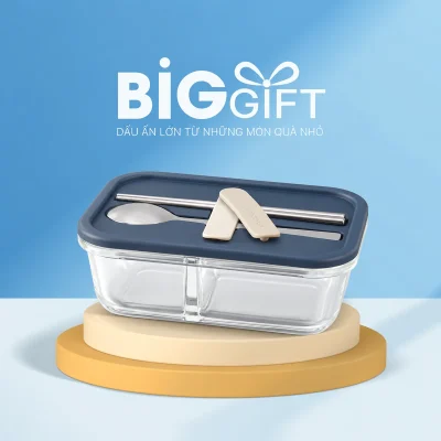 Hộp cơm thủy tinh hai ngăn nắp navy và vị trí gài đồ dùng trên nền BigGift