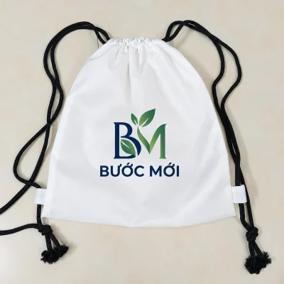Demo BM BƯỚC MỚI xanh navy và xanh lá trên túi rút trắng dây đen